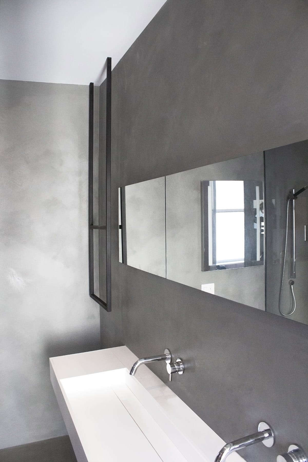 Grey bathroom with black and white