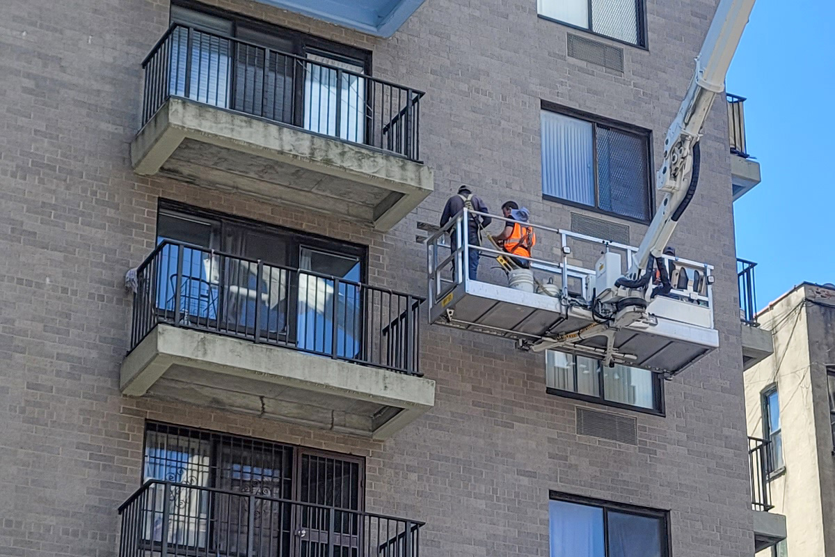 QEWI performing an NYC FISP Inspection