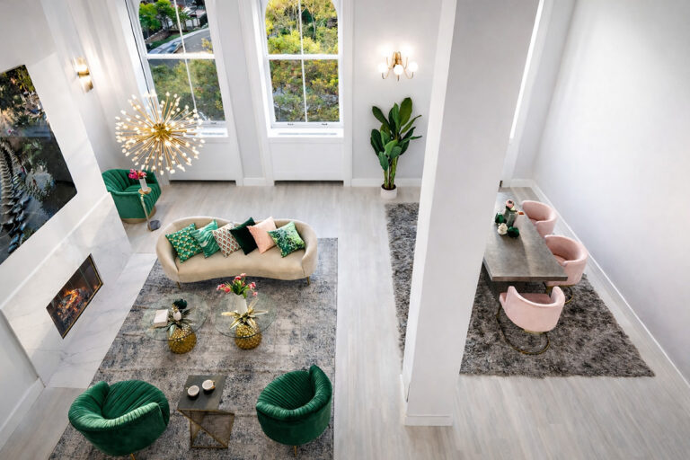Double-height great room in a Tribeca loft renovation designed around light, volume, and calm.