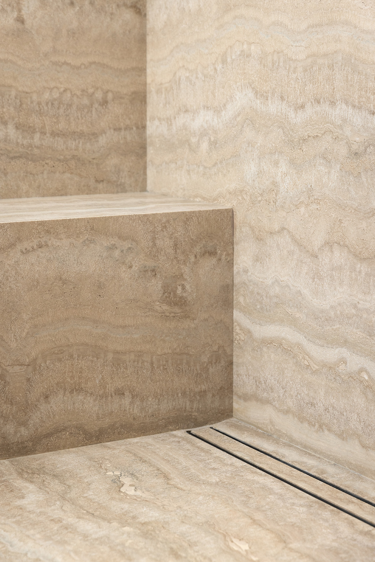 Travertine Stone Shower with Integrated Bench